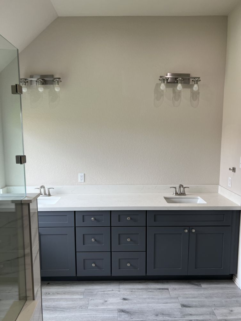 Charcoal double-sink bathroom vanity with white quartz countertop